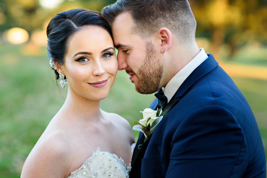 A groom hugs his bride on their wedding day in bucks county.